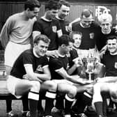 Dundee Football Club - Scottish League Champions for the 1961-1962 season. Back row left to right: Pat Liney, Gordon Smith, Alan Gilzean, Bobby Wishart, Ian Ure, trainer Sammy Kean and right half Bobby Seith. Front row: Andy Penman, Bobby Cox, Alex Hamilton, Alan Cousin and Hugh Robertson.