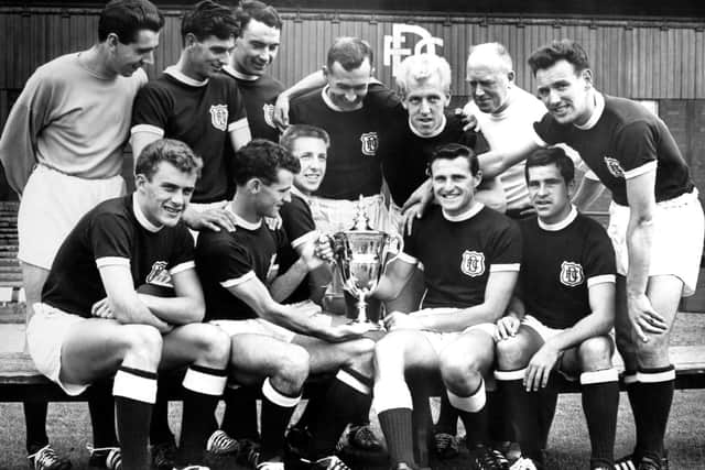 Dundee Football Club - Scottish League Champions for the 1961-1962 season. Back row left to right: Pat Liney, Gordon Smith, Alan Gilzean, Bobby Wishart, Ian Ure, trainer Sammy Kean and right half Bobby Seith. Front row: Andy Penman, Bobby Cox, Alex Hamilton, Alan Cousin and Hugh Robertson.