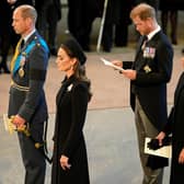 Prince Harry and Meghan, Duchess of Sussex, seen with the Prince and Princess of Wales during Queen Elizabeth's Lying-in State (Picture: Christopher Furlong/Getty Images)