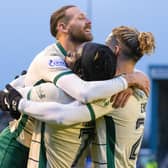 Martin Boyle, Elie Youan and Emiliano Marcondes celebrate Hibs' win over Inverness.