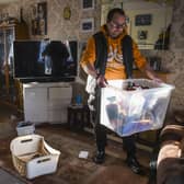 Kinloss Park resident Andrew McIntosh looks through his damaged belongings. Picture: Lisa Ferguson





Parts of CupaR  were hit badly, the River Eden burst its banks and Kinloss Park residents houses were flooded by the Ladyburn over flowing also