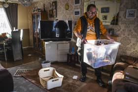 Kinloss Park resident Andrew McIntosh looks through his damaged belongings. Picture: Lisa Ferguson





Parts of CupaR  were hit badly, the River Eden burst its banks and Kinloss Park residents houses were flooded by the Ladyburn over flowing also