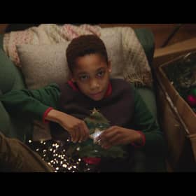 Shoppers can buy a version of the Christmas jumper that Nathan gives Skye for between £14 and £29. Photo: John Lewis and Partners.