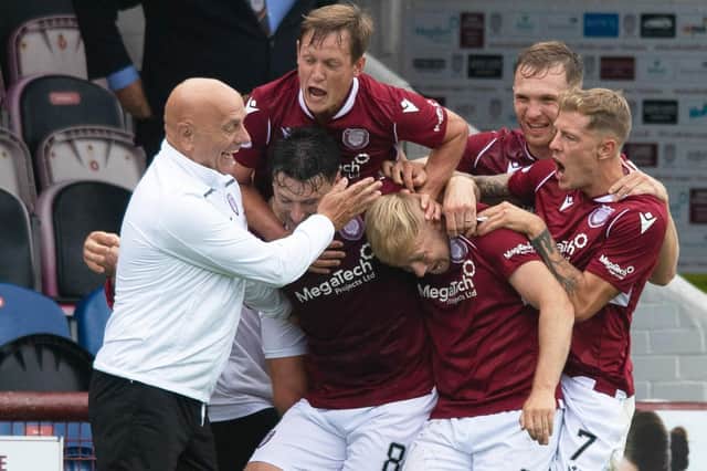 Arbroath players celebrate Michael McKenna's equaliser in the 3-1 win over Partick at Gayfield. (Photo by Mark Scates / SNS Group)
