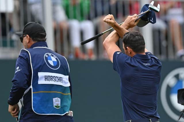 Billy Horschel gestures to fans as he leaves the 18th green after the final round at Wentworth. Picture: Glym Kirk/AFP via Getty Images.