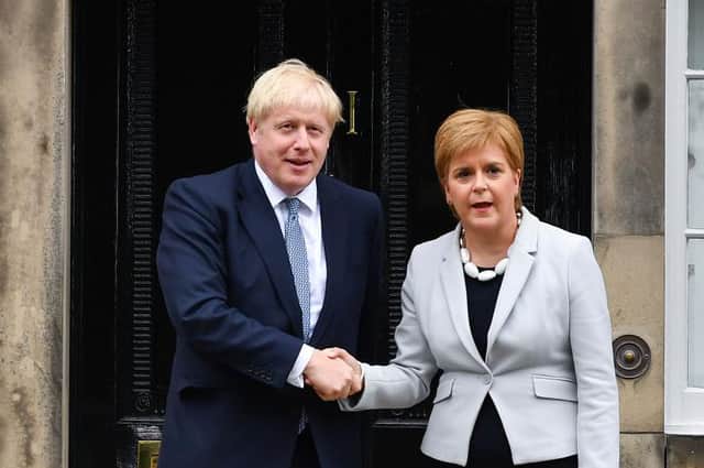 Nicola Sturgeon and Boris Johnson need to recognise the urgent need for a Covid inquiry (Picture: Jeff J Mitchell/Getty Images)