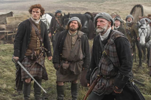 Sam Heughan, Bill Paterson, Graham McTavish in season one of Outlander, 2014. Pic: Photo by Starz! Movie Channel/Courtesy/Shutterstock