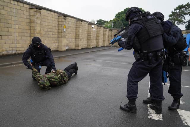 Police Scotland's officers, seen taking part in a training exercise, have more serious things to do that investigate every spurious complaint under the incoming Hate Crime Act (Picture: Andrew Milligan/PA)