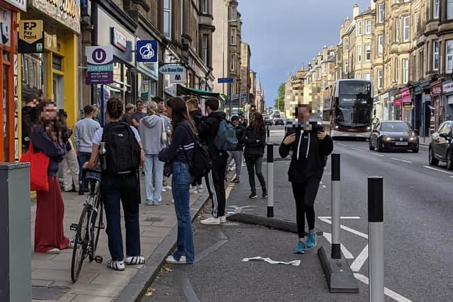 A queue of over 30 people spotted waiting to view a Morningside Road flat this month