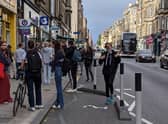 A queue of over 30 people spotted waiting to view a Morningside Road flat this month