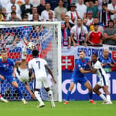 Jude Bellingham scores an overhead kick in the fifth minute of stoppage time to save England from a 1-0 defeat to Slovakia at Euro 2024. (Photo by Carl Recine/Getty Images)