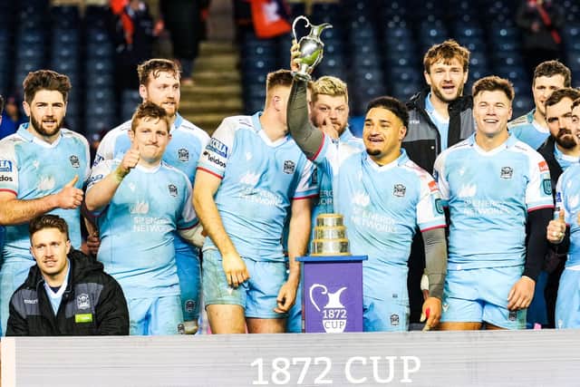 Glasgow Warriors lifted the 1872 Cup despite defeat by Edinburgh at Murrayfield.