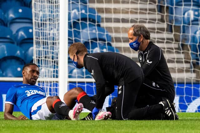 Jermain Defoe receives treatment for the suspected hamstring injury he sustained during Rangers' 4-0 friendly win over Motherwell at Ibrox on Wednesday night.