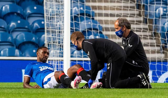 Jermain Defoe receives treatment for the suspected hamstring injury he sustained during Rangers' 4-0 friendly win over Motherwell at Ibrox on Wednesday night.