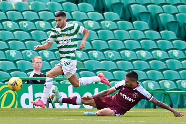 Celtic's Liel Abada (left) competes with Manuel Lanzini during a friendly match against West Ham.