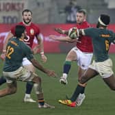 Finn Russell chips the ball through a gap in the South African defence during the Lions' defeat in the third Test. Picture: Halden Krog/AP