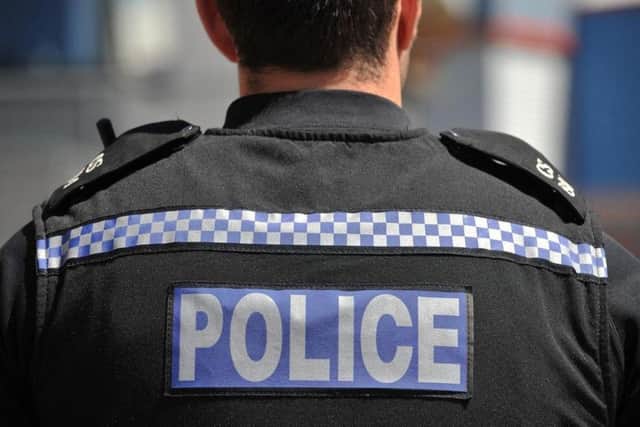 An investigation has been launched after a serving police officer and child were found dead.
