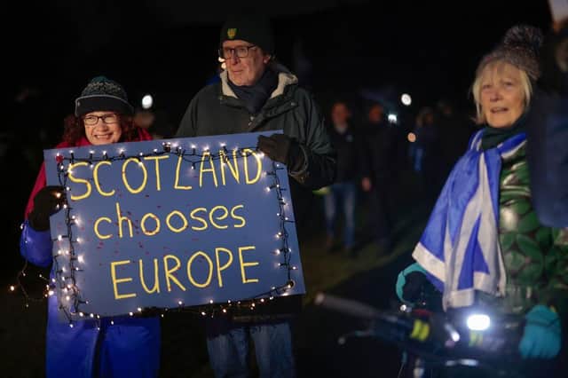 Anti-Brexit campaigners take part in a torchlight procession to the Scottish Parliament in 2023. Picture: Jeff J Mitchell/Getty Images