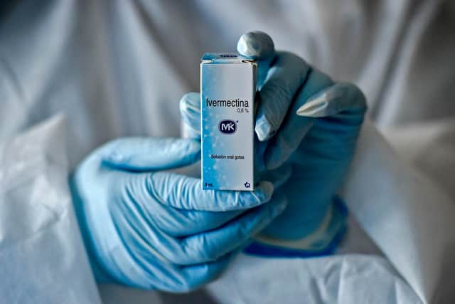 A health worker shows a box containing a bottle of Ivermectin as part of a study in Colombia in 2020. Picture by LUIS ROBAYO/AFP via Getty Images