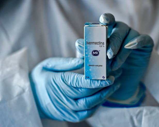 A health worker shows a box containing a bottle of Ivermectin as part of a study in Colombia in 2020. Picture by LUIS ROBAYO/AFP via Getty Images