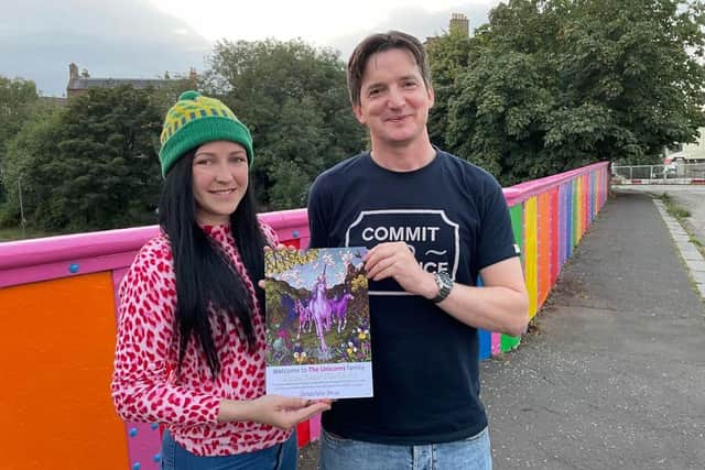 Roisin Therese with partner Toby Saltonstall with the award for transforming the Leith bridge into a piece of community art