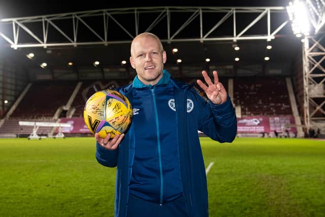 Hearts forward Steven Naismith scored three times against Arbroath.