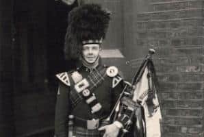 John Dickson in piping regalia