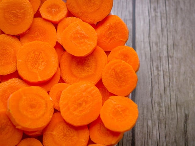 Perhaps surprisingly, many dogs can't get enough of the crunchy consistency of slices of raw carrot. It's one of the healthiest treats so you don't have to be too worried about how much they eat.