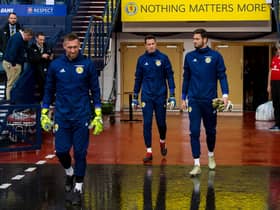 Jon McLaughlin (centre) and Craig Gordon (right) during a Scotland training session
