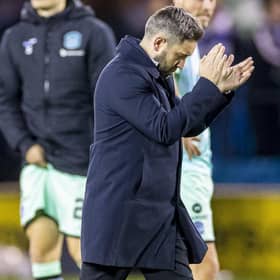Hibs manager Lee Johnson cuts a dejected figure after the 1-0 defeat at Kilmarnock before t. (Photo by Roddy Scott / SNS Group)