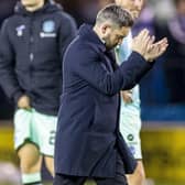 Hibs manager Lee Johnson cuts a dejected figure after the 1-0 defeat at Kilmarnock before t. (Photo by Roddy Scott / SNS Group)