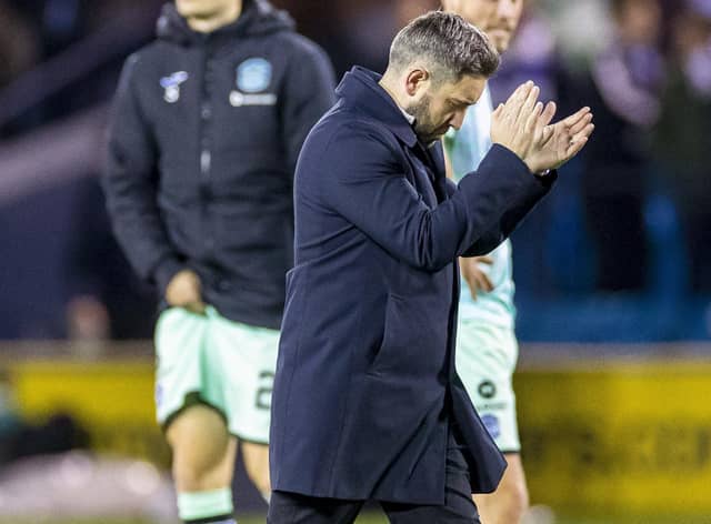 Hibs manager Lee Johnson cuts a dejected figure after the 1-0 defeat at Kilmarnock before t. (Photo by Roddy Scott / SNS Group)