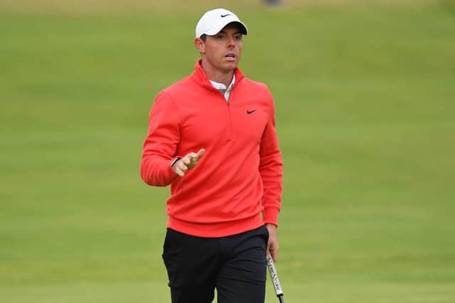 Rory McIlroy reacts after he holes his birdie putt on the 18th green at Royal St George's. Picture: Andy Buchanan/AFP via Getty Images.