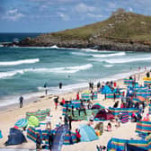 Holidaymakers enjoy the sunny weather at Porthmeor Beach in St Ives, Cornwall (Picture: Matt Cardy/Getty Images)