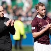 Hearts interim manager Steven Naismith and Nathaniel Atkinson applaud the fans at full time.