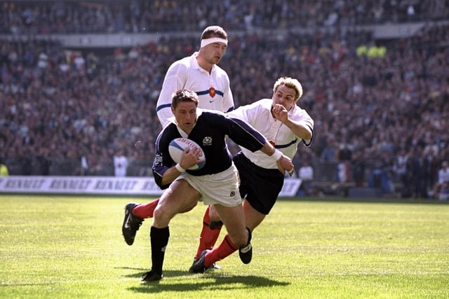 Alan Tait on his way to scoring his first try in the 36-22 win against France in 1999. The centre scored two in Paris that afternoon to cap an outstanding Five Nations campaign in which he combined expertly with Gregor Townsend and John Leslie in a highly creative Scotland midfield. Tait had also scored a try double in the narrow defeat by England and one in the opening win over Wales.
