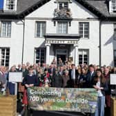 Members of the Burnett family and guests outside the Burnett Arms