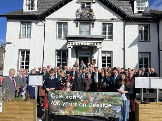 Members of the Burnett family and guests outside the Burnett Arms