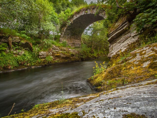 The area around Ballindalloch Castle and Bridge of Avon, in Moray, is rich in pretty woodland that's best seen in autumn. While you're there take a visit to the atmospheric Ballindalloch stone circle.