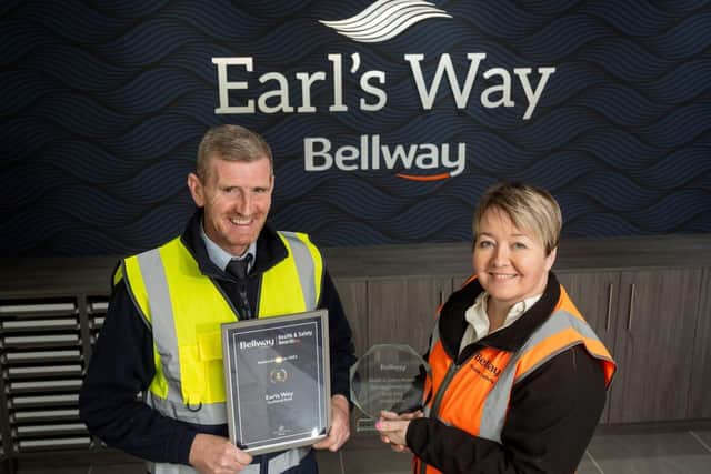 Peter Lawrie receiving 2023 Bellway National Health and Safety Award from Claire Birkhead 