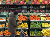 There are calls for both the UK and Scottish Governments to act while households and businesses face “immense pressure” (Photo by DANIEL LEAL/AFP via Getty Images).