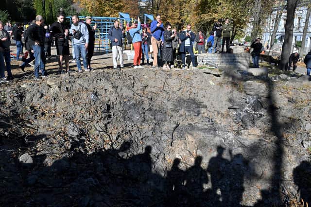 A crater left by a Russian missile which landed next to a children's playground in central Kyiv (Picture: Sergei Supinsky/AFP via Getty Images)