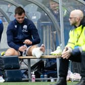 Scotland's Ben White looks dejected after he picked up an injury.