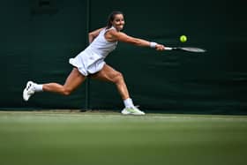 Jodie Burrage returns the ball to US player Caty McNally during her first round defeat at Wimbledon. (Photo by KIRILL KUDRYAVTSEV/AFP via Getty Images)