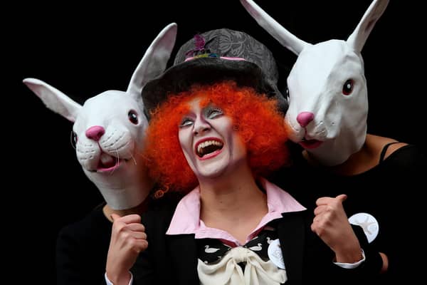 This is either an actor dressed as the Mad Hatter or an SNP Cabinet minister, it's hard to tell (Picture: Julien Behal/PA Wire)