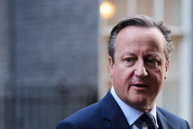 The UK's Foreign Secretary David Cameron leaves from 10 Downing Street after attending a cabinet meeting.