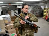 Iryna Sergeyeva, a volunteer, attends military training in an underground garage in Kyiv in March last year (Picture: Sergei Supinsky/AFP via Getty Images)