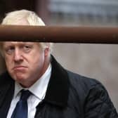 Boris Johnson, seen visiting a farm near Banchory, has been damaging support for the Scottish Conservatives for years (Picture: Andrew Milligan/WPA pool/Getty Images)