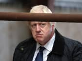 Boris Johnson, seen visiting a farm near Banchory, has been damaging support for the Scottish Conservatives for years (Picture: Andrew Milligan/WPA pool/Getty Images)