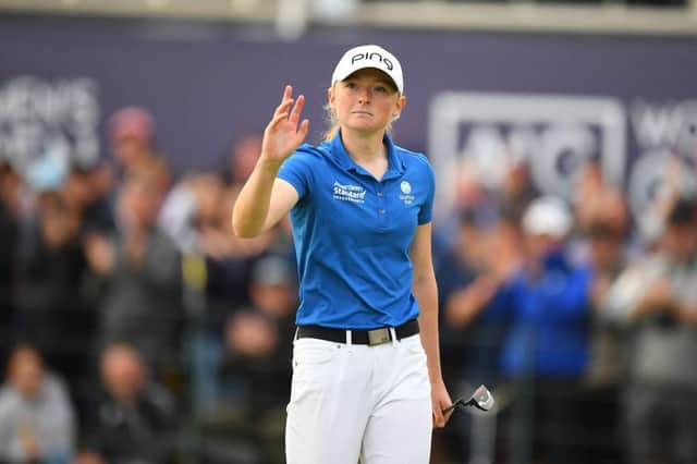 Louise Duncan acknowledges the applause on the 18th green during the AIG Women's Open at Carnoustie. Picture: Andy Buchanan/AFP via Getty Images.